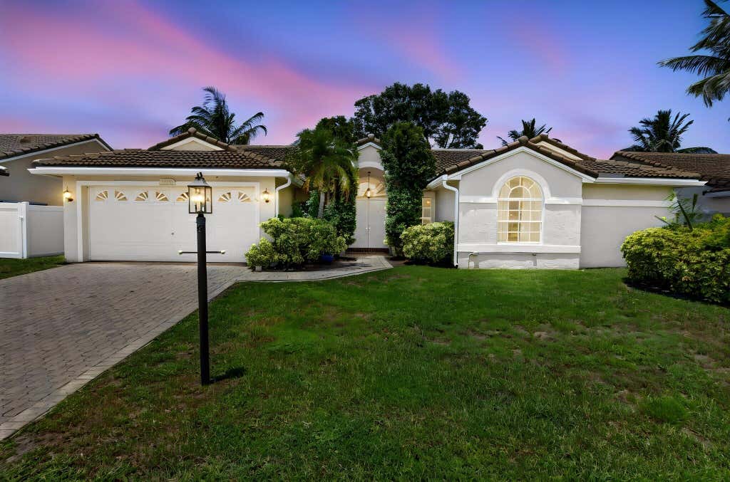 Photo of 9415 Lake Serena Drive, Boca Raton, FL 33496 (MLS # B26057848)