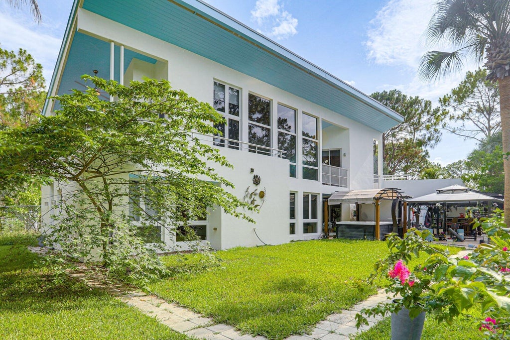 Photo of 930 RAMBLING DRIVE Circle, Wellington, FL 33414 (MLS # B26081021)