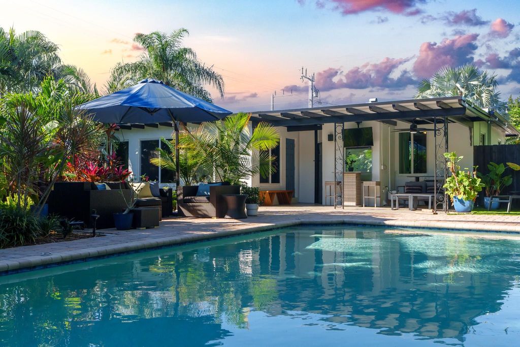 Photo of 1302 NE 33rd Street, Oakland Park, FL 33334 (MLS # F10420959)