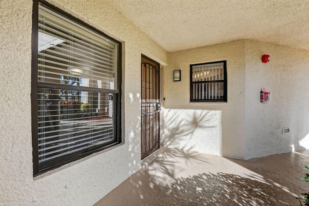 Photo of 5650 Camino Del Sol #106, Boca Raton, FL 33433 (MLS # R11145856)