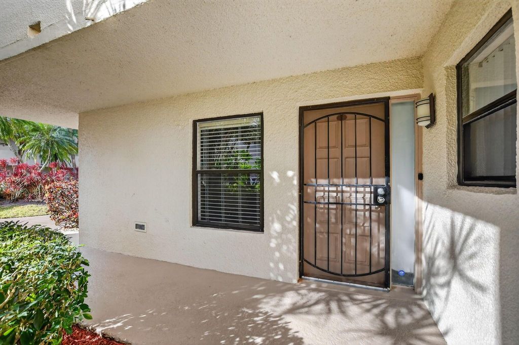 Photo of 5650 Camino Del Sol #106, Boca Raton, FL 33433 (MLS # R11145856)