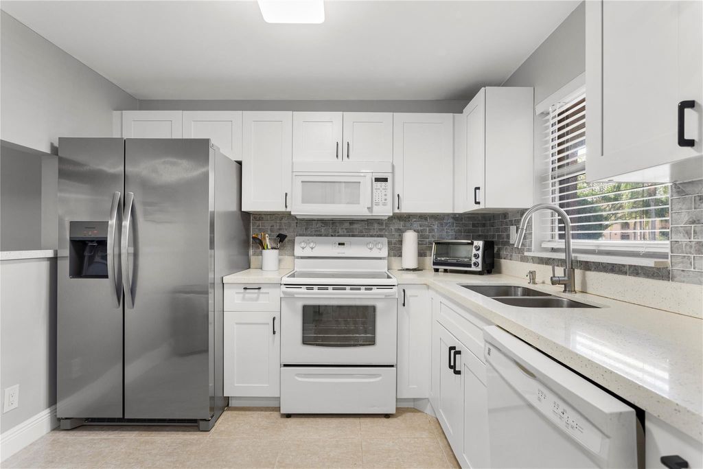 Photo of 9700 Sunrise Lakes Boulevard #101, Sunrise, FL 33322 (MLS # F10546453)