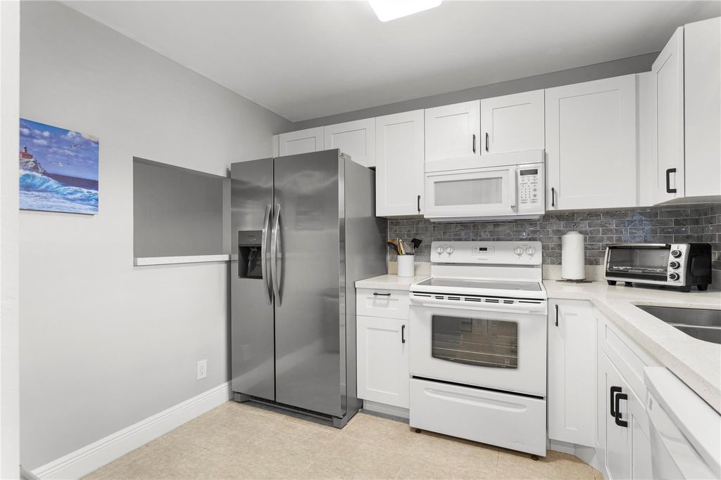 Photo of 9700 Sunrise Lakes Boulevard #101, Sunrise, FL 33322 (MLS # F10546453)