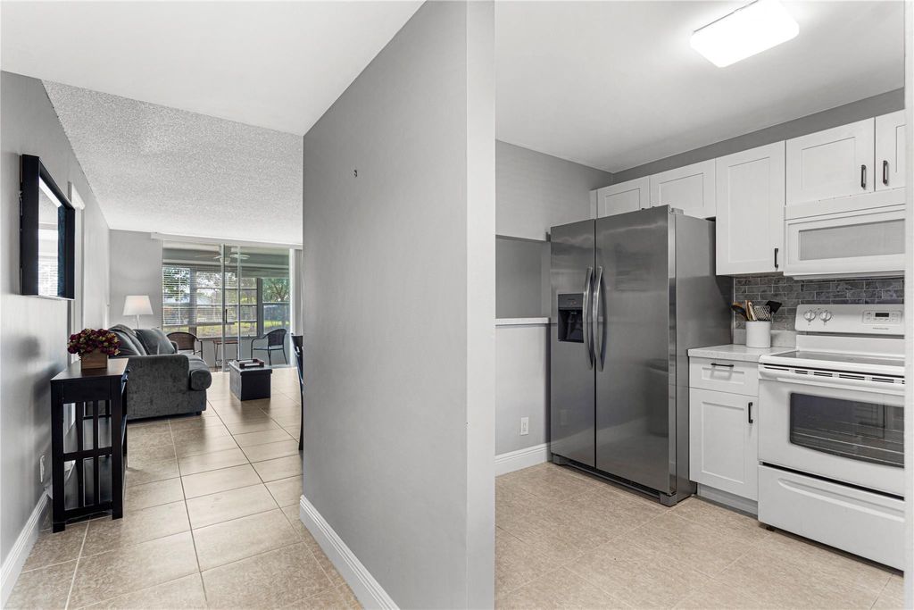 Photo of 9700 Sunrise Lakes Boulevard #101, Sunrise, FL 33322 (MLS # F10546453)