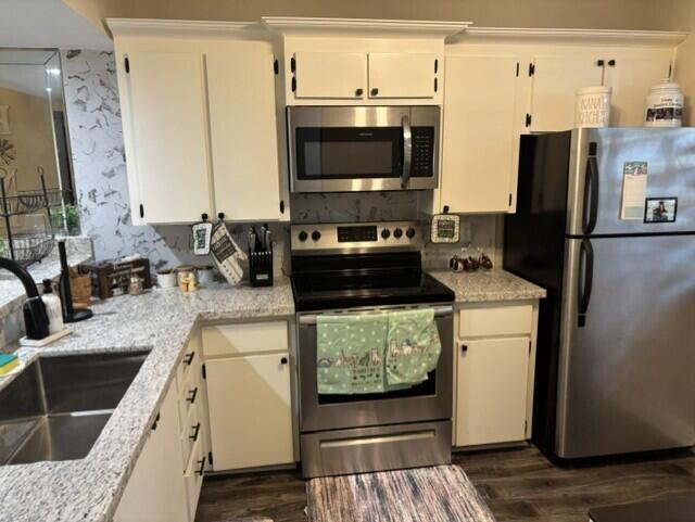 Photo of 1707 WHITEHALL Drive #105, Davie, FL 33324 (MLS # B26074107)