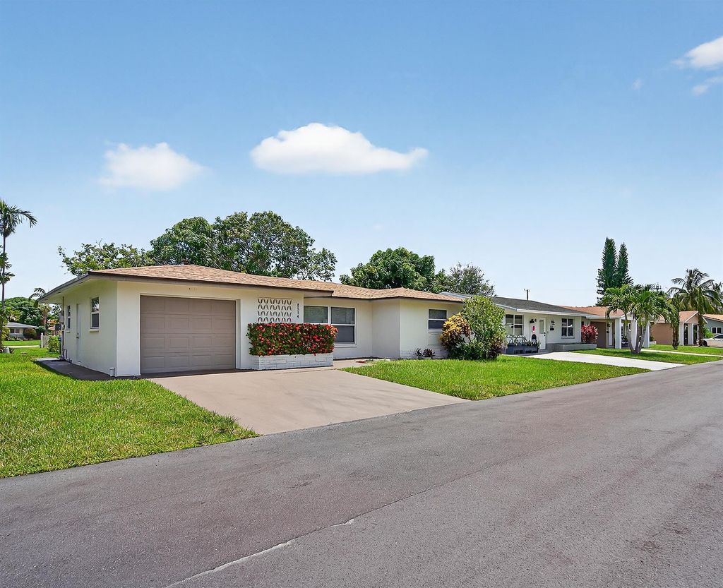 Photo of 5714 NW 70th Ter, Tamarac, FL 33321 (MLS # F10516891)