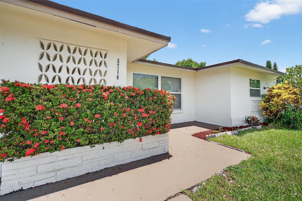 Photo of 5714 NW 70th Ter, Tamarac, FL 33321 (MLS # F10516891)