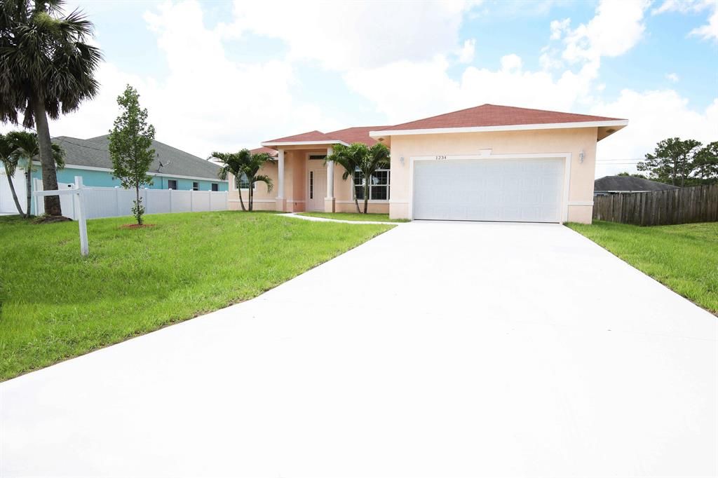 Photo of 1234 SW Santiago Avenue, Port Saint Lucie, FL 34953 (MLS # R10733216)
