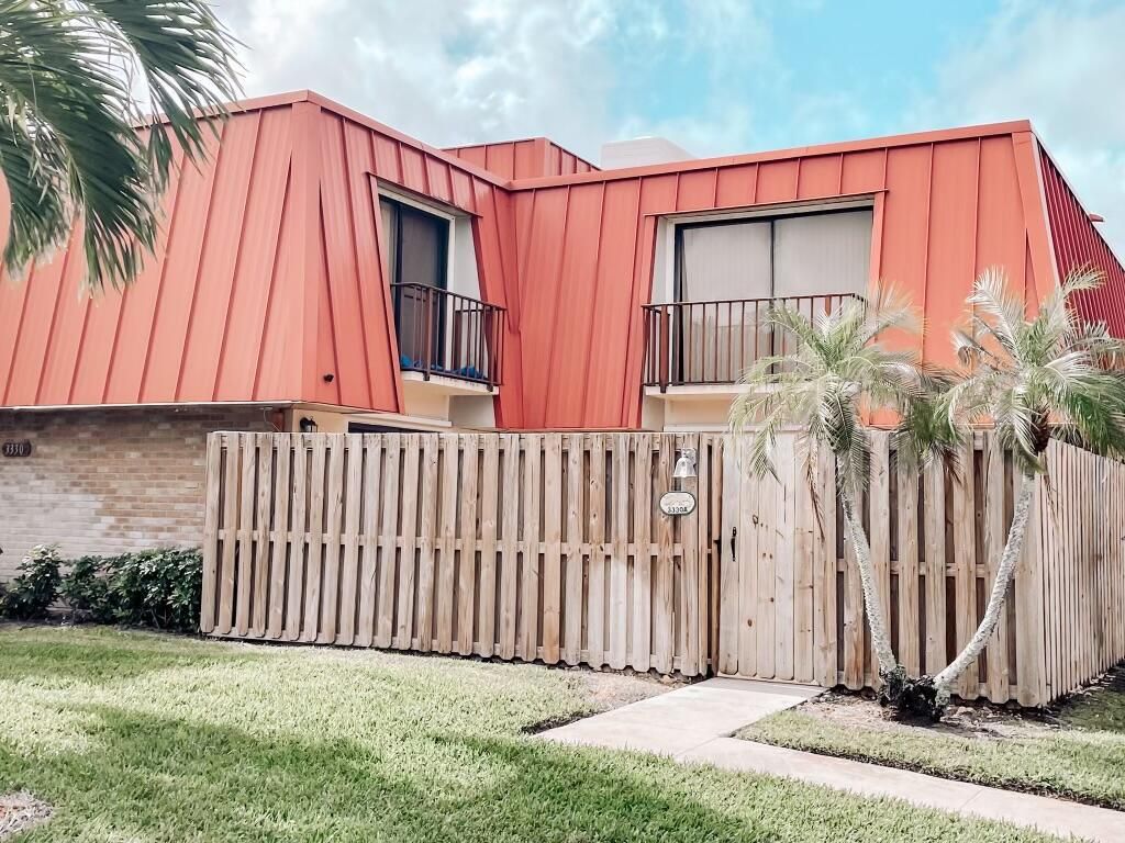 Photo of 3330 Meridian Way S #A, Palm Beach Gardens, FL 33410 (MLS # R10858396)