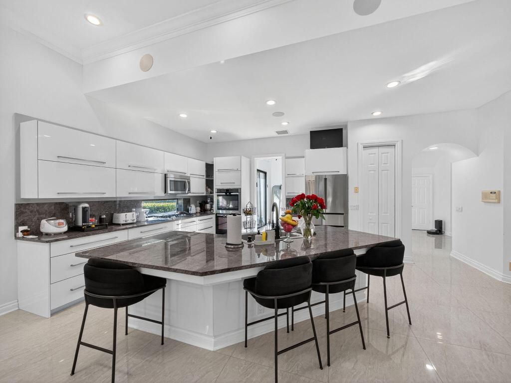 Photo of 125 Pembroke Drive, Palm Beach Gardens, FL 33418 (MLS # R11154021)