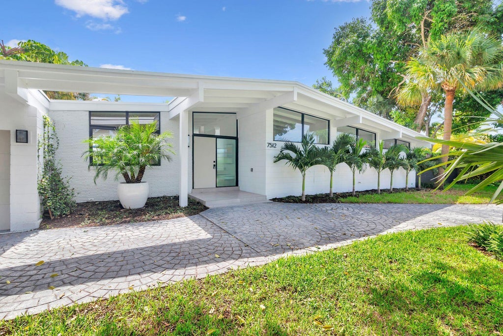 Photo of 7512 W Lake Drive, West Palm Beach, FL 33406 (MLS # B26088611)