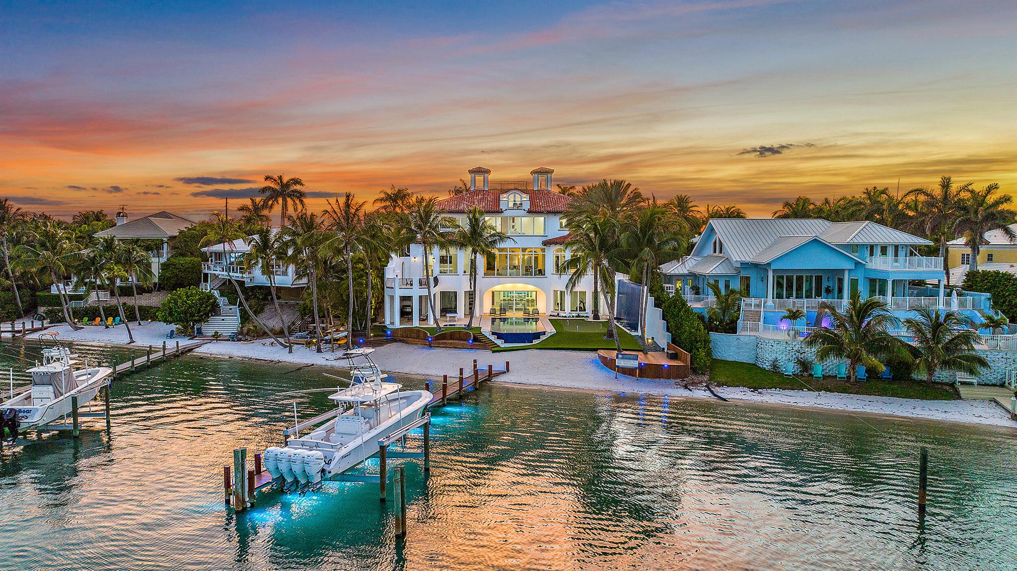 One-Of-A-Kind Grand Intracoastal Estate on Turquoise Blue Water - It doesn't get any better than this location. A massive two year project updating this contemporary home was recently completed. Features include sleek and clean lines, wood floors, floor to ceiling picture glass windows with unsurpassed Intracoastal views as far as the eyes can see. Plenty of room to accommodate a large family and guests with 9 Bedrooms, 5 in the main house and a 4-bedroom guest house with a private courtyard entrance, 5th floor observation deck with views of the Atlantic Ocean. If you want luxury and privacy this property is for you...every conceivable amenity in your own home. See More...