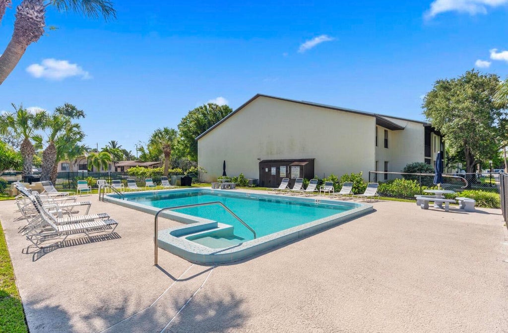 Photo of 250 SE Four Winds Drive #104, Stuart, FL 34996 (MLS # B26078298)