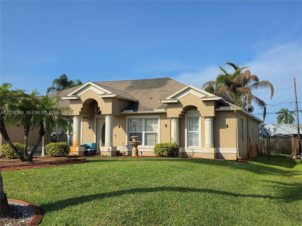 Photo of 2637 SW Monterrey Lane, Port Saint Lucie, FL 34953 (MLS # A12010549)