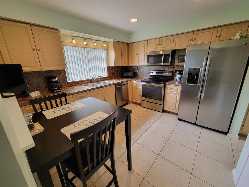 Photo of 4941 Dovewood Road #A, Boynton Beach, FL 33436 (MLS # R11079614)