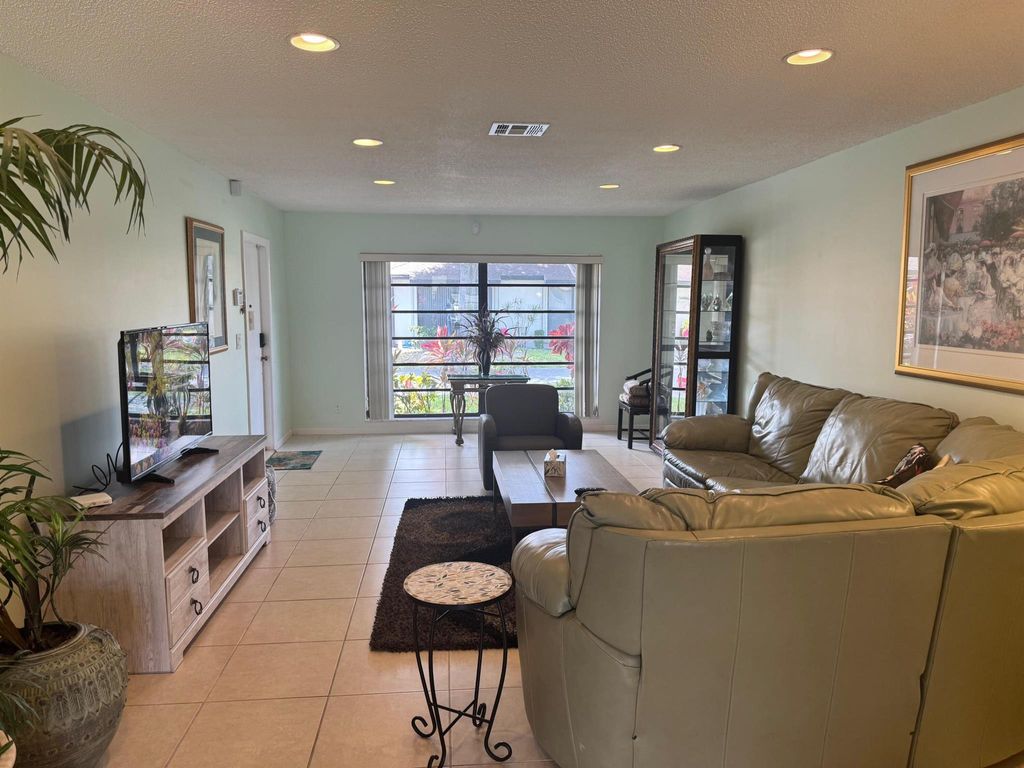 Photo of 4941 Dovewood Road #A, Boynton Beach, FL 33436 (MLS # R11079614)