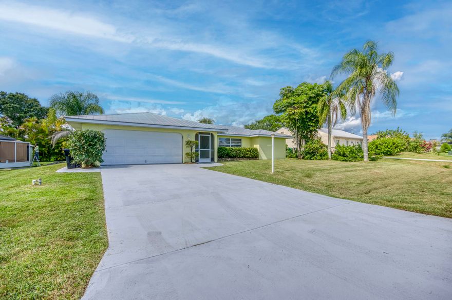 Large move-in-ready 3/2/2 with solid CBS construction and a metal roof. This home is just under 2,100 sq ft and features a large Florida room, tile floors throughout, solid wood cabinets in the kitchen with stainless appliances, large backyard, family room, and separate living room, plus much more. Schedule your private viewing today!