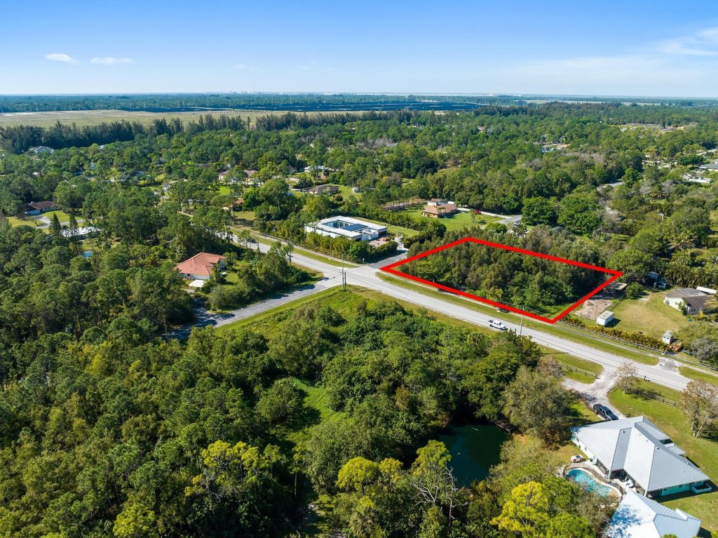 Photo of Xxx Corner Of 63rd Rd N &amp; Mandarin, The Acreage, FL 33470 (MLS # R10976972)