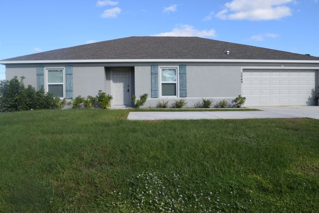 Photo of 3949 SW Savona Boulevard, Port Saint Lucie, FL 34953 (MLS # R11048481)