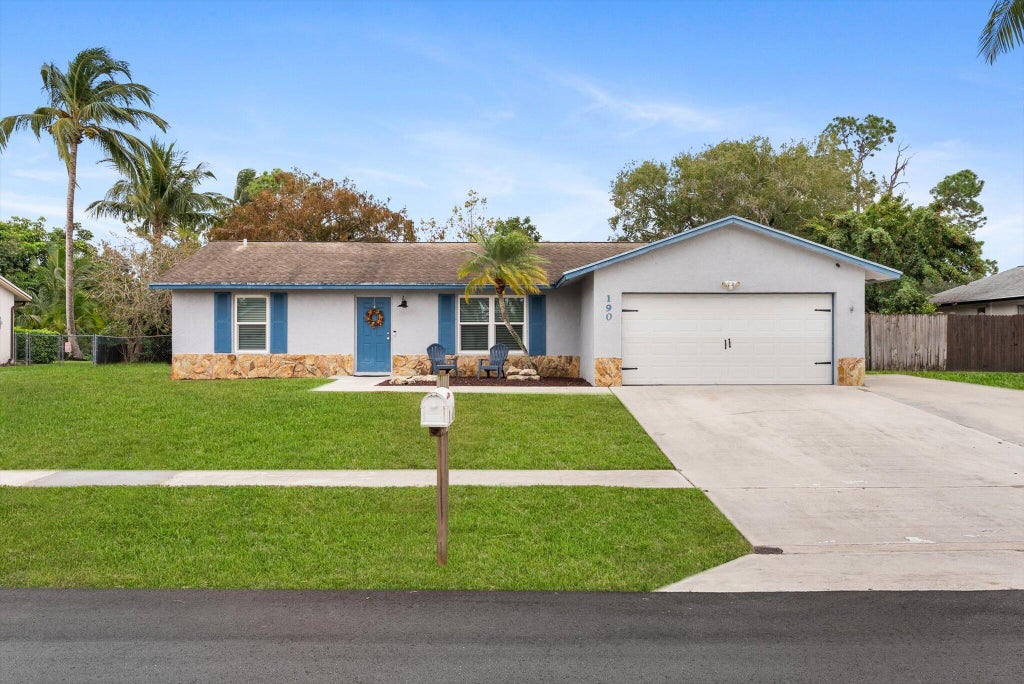 Photo of 190 Martin Circle, Royal Palm Beach, FL 33411 (MLS # R11154853)