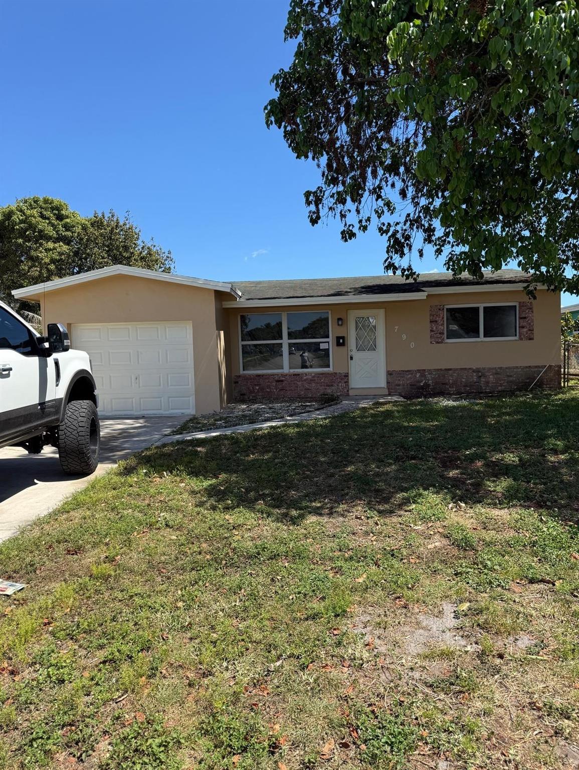 Nestled in a prime location across from a beautiful park, this freshly painted single-family home is a perfect blend of comfort and convenience. The interior boasts tile and wood flooring throughout, a modern kitchen with granite countertops, and an updated bathroom. French doors add a touch of elegance, and the home comes equipped with a washer and dryer for added convenience.
The large backyard offers plenty of space for outdoor activities, while the location is unbeatable—just minutes from Sawgrass Mall, top-rated schools, and major highways.
Don't miss out on this gem—schedule your showing today before it's gone!