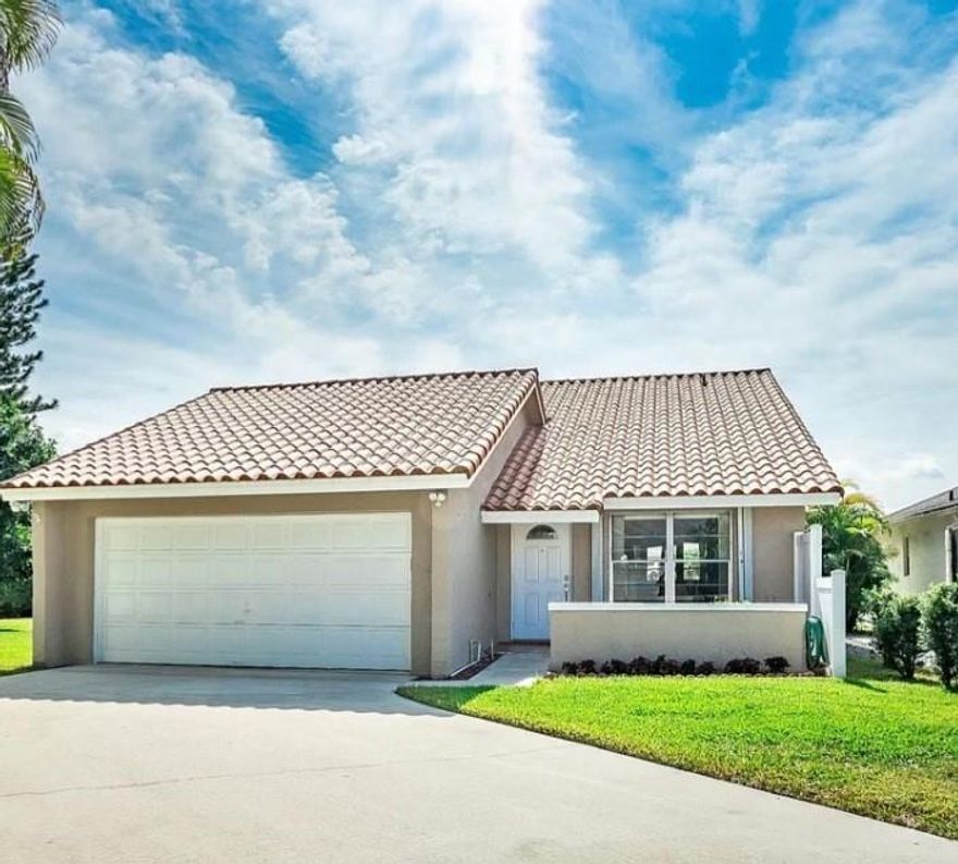 LOVELY 3 BED 2 BATH WITH 2 CAR GARAGE IN DESIRABLE PINE SPRINGS COMMUNITY IN BOCA RATON. DIRECTLY ACROSS THE STREET FROM COMMUNITY CENTER AND POOL, HUGE DRIVEWAY ON A PARTIAL CUL-DE-SAC, HUGE FENCED-IN YARD, MOVE-N READY WITH TILED SCREENED PATIO, ADT SMART HOME SECURITY SYSTEM WITH DOORLOCK, SECURITY CAMERAS, SMART VIDEO DOORBELL, NEST THERMOSTAT, SMART GARAGE & LIGHTS. AT&T FIBER READY. GRANITE COUNTERTOPS AND STAINLESS-STEEL APPLIANCES IN KITCHEN. A/C, WATER HEATER, WASHER & DRYER, INTERIOR PAINT, CEILING FANS 2 YRS OLD. UPGRADED GUEST BATH, HURRICANE SHUTTERS, LOW $160/MO. HOA INCL. LAWN MAINTENANCE, GREAT SCHOOLS, CLOSE TO TOWN CENTER MALL, NEW UPTOWN BOCA, GREAT RESTAURANTS AND SHOPS, MINUTES FROM TURNPIKE AND I95