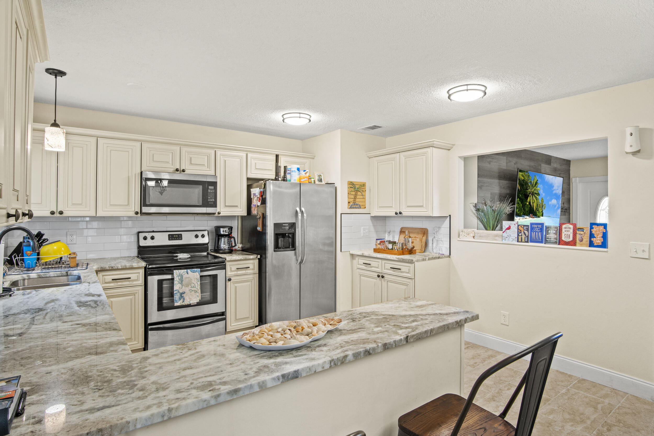 Beautifully renovated 3-bedroom, 2-bath single-family home in Port St. Lucie!Featuring a new roof, new A/C and a one -car garage, this home offers modern comfort and peace of mind. The open layout includes a stylish kitchen, updated bathrooms, and perfect for entertaining or relaxing outdoors. Flexible rental options-available fully furnished, partially furnished, or unfurnished to suit your needs. Conveniently located near shopping, dining, schools and major highways.