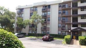 Photo of 2701 RIVERSIDE Drive #105-B, Coral Springs, FL 33065 (MLS # B26065179)