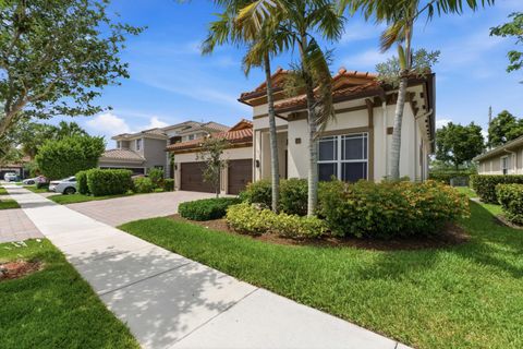 Photo of 9871 Lakeview Lane, Parkland, FL 33076 (MLS # B26033127)