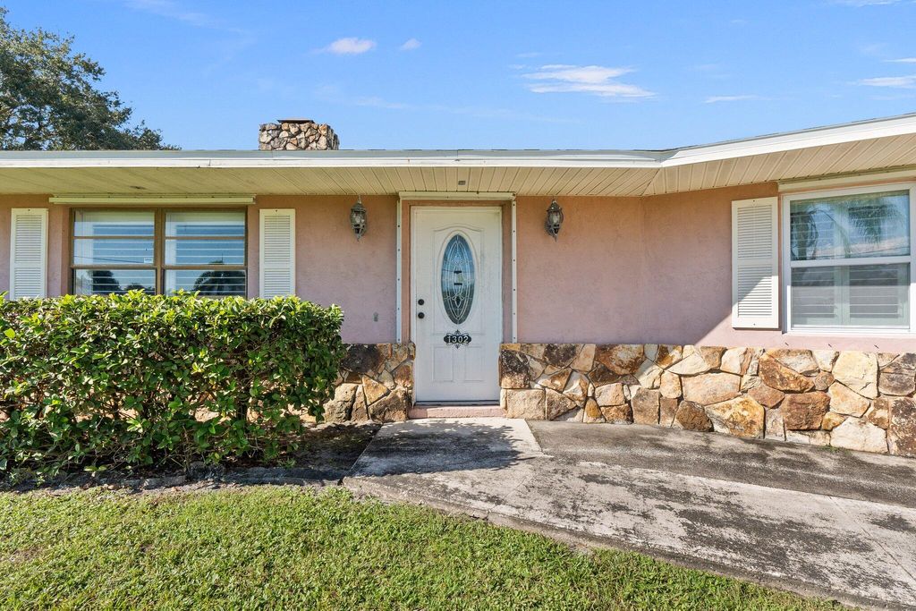 Photo of 1302 SE Coral Reef Street, Port Saint Lucie, FL 34983 (MLS # R11026700)