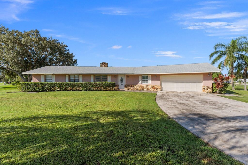 Photo of 1302 SE Coral Reef Street, Port Saint Lucie, FL 34983 (MLS # R11026700)