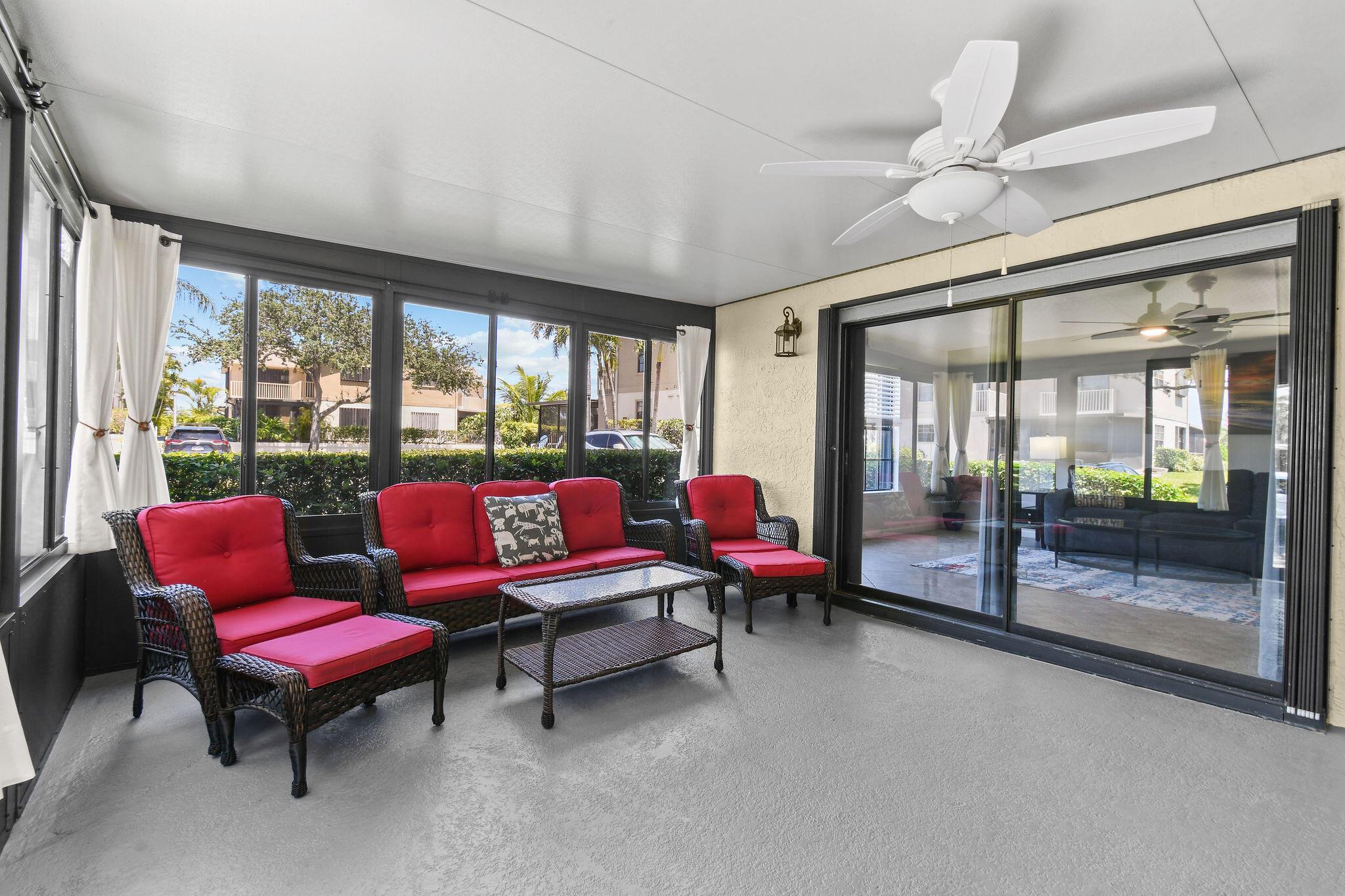 PRICE IMPROVEMENT! BEST VALUE IN JAMESTOWN. Charming and spacious 2-bedroom, 2-bathroom townhome located near the public golf course in Heritage Ridge at Jamestown, Hobe Sound. Just a 7-minute drive to the beautiful Hobe Sound Public Beach, fine dining and more.This townhome features a superior location within the community, just a few steps from the community pool. Enjoy ceramic tile flooring downstairs, new carpeting on the staircase, and stylish laminate flooring in the bedrooms. The living room and kitchen open to a large, fully enclosed patio with glass windows, offering a versatile bonus space that you can customize to your liking! The kitchen boasts beautiful granite countertops and stainless-steel appliances, while the bathrooms have been remodeled with granite vanity tops