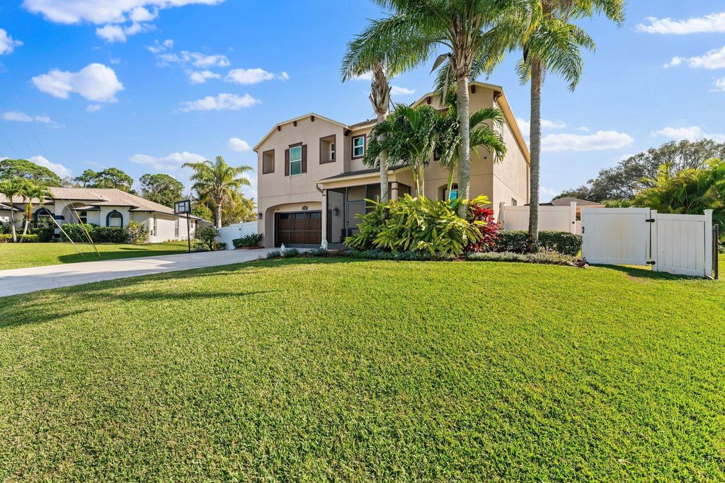 Photo of 2198 SW Certosa Road, Port Saint Lucie, FL 34953 (MLS # R10959967)