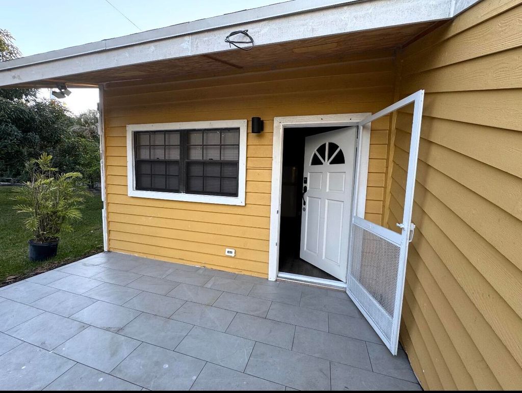 Photo of 5239 Club Road, Haverhill, FL 33415 (MLS # R11162435)