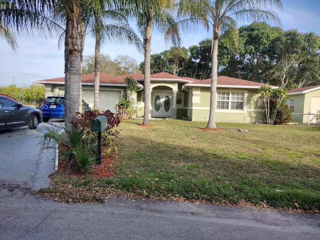 Photo of 318 N 24th Street, Fort Pierce, FL 34950 (MLS # R11152336)