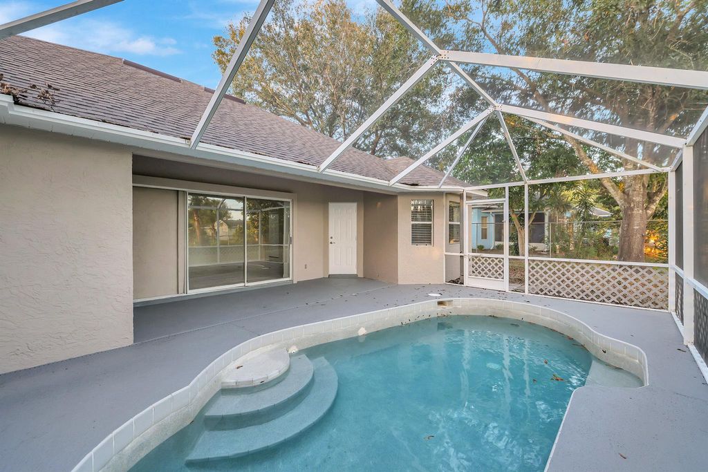 Photo of 412 SE Evans Avenue, Port Saint Lucie, FL 34984 (MLS # R10920064)