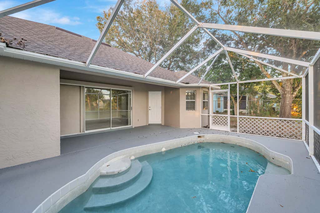 Photo of 412 SE Evans Avenue, Port Saint Lucie, FL 34984 (MLS # R10920064)