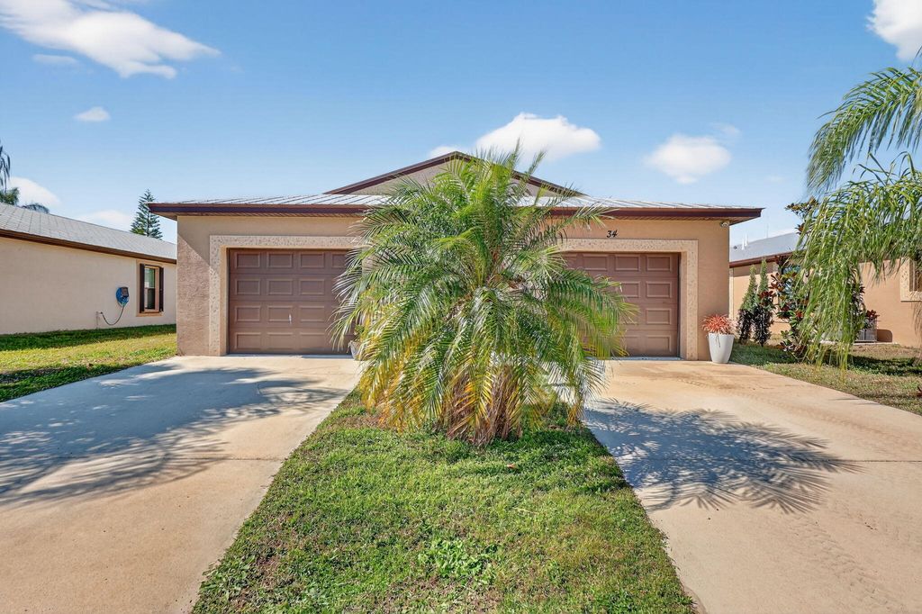 Photo of 34 Nogales Way, Port Saint Lucie, FL 34952 (MLS # R11159056)