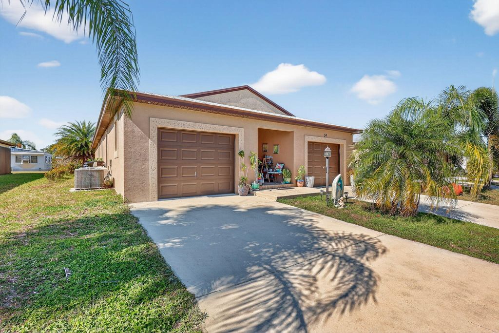 Photo of 34 Nogales Way, Port Saint Lucie, FL 34952 (MLS # R11159056)