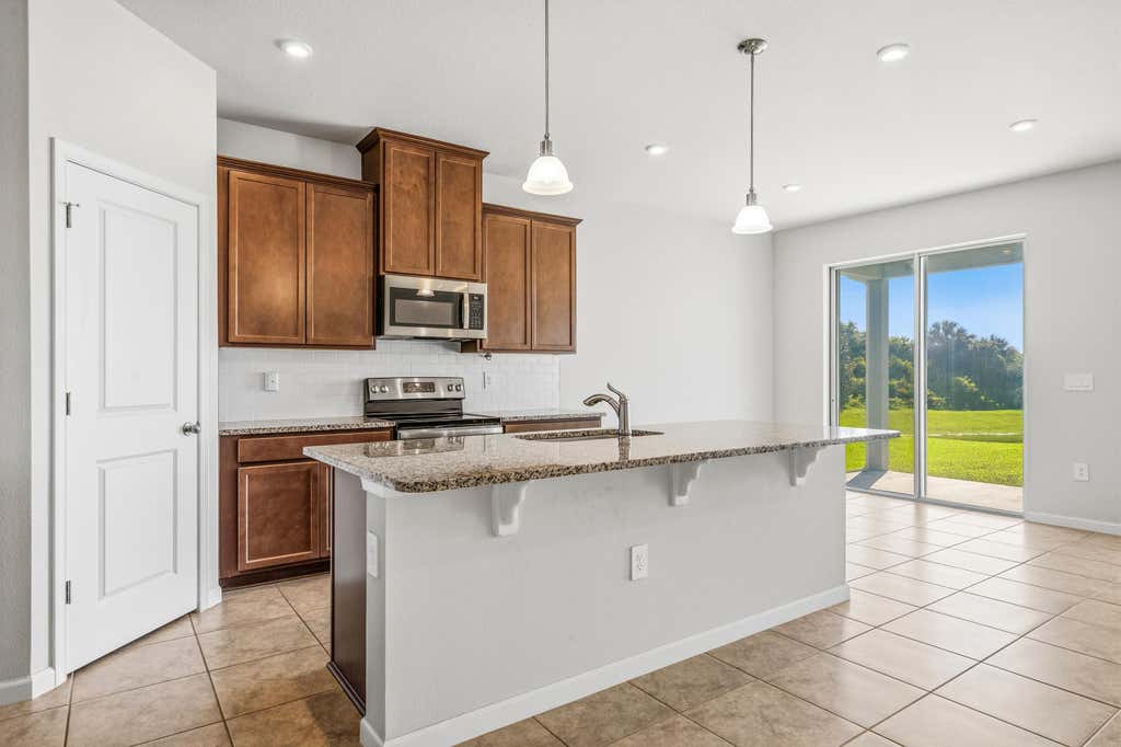 Photo of 6640 Canterbridge Drive, Vero Beach, FL 32967 (MLS # B26059379)