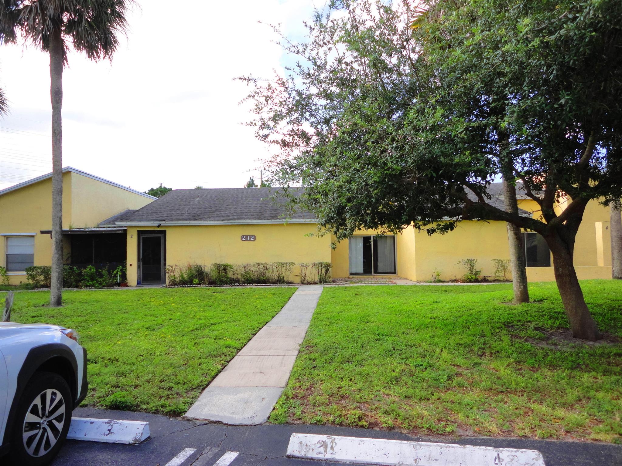 Spacious home with large living room, newer kitchen cabinets, granite countertops. Large covered and screened patio with great views of the waterway.