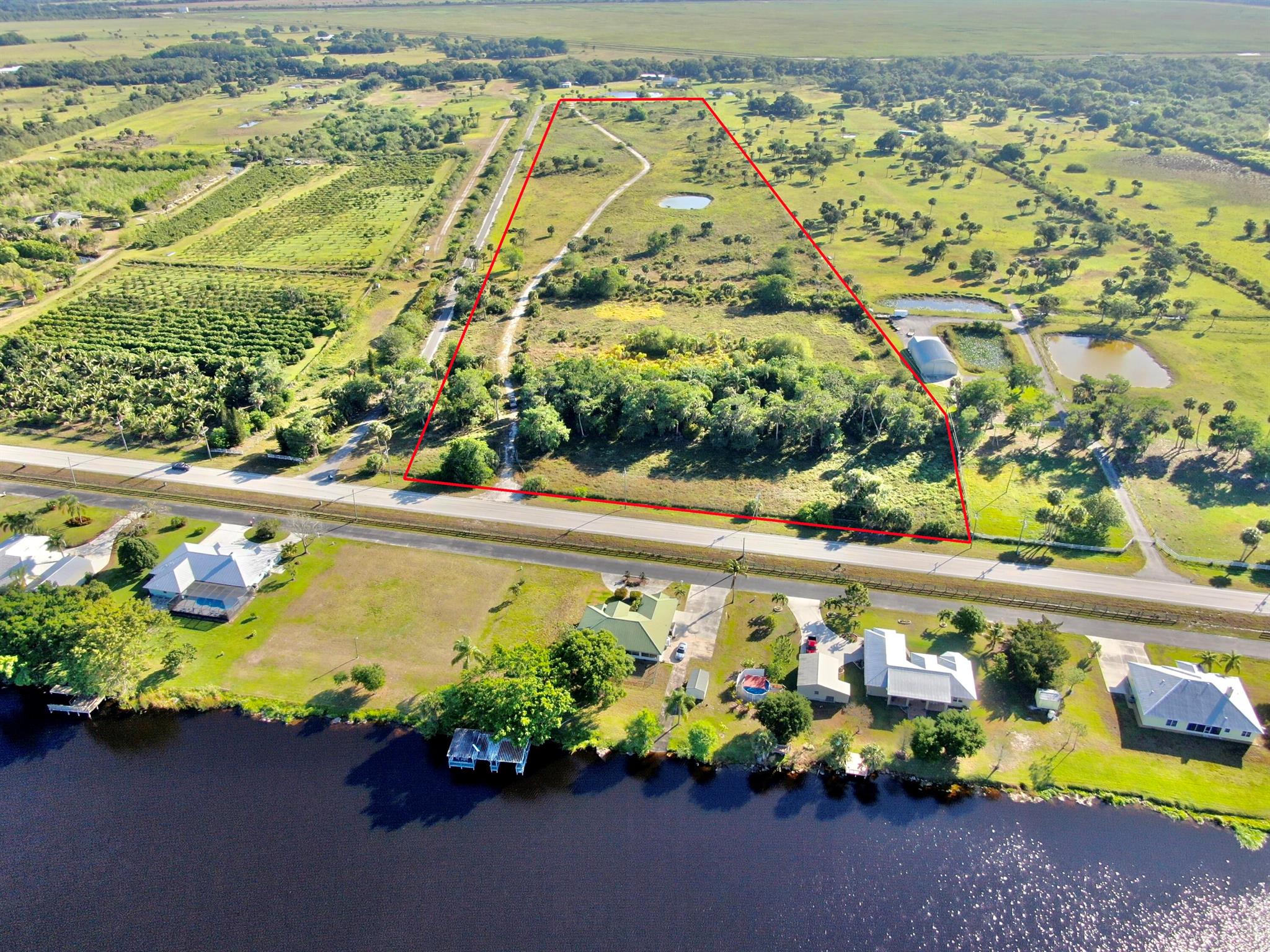 Fantastic opportunity to own 27.5 acres of land in the City of Okeechobee. Fenced. No wetlands ! The first 700 ft (front of the property) is zoned High Density; approximately 8 acres. The rest of the property (back) is zoned Ag Residential and allows 1 single family home for 5 acres and a mother in law suite up to 25% the size of the main home.Located on Highway 441 - a major North/South transportation artery through the County and City of Okeechobee. The location makes for an exceptional traffic coming in from either North, East or South.Steps away from Lake Okeechobee, Florida's largest freshwater lake. Be part of the exciting growth coming to the area that includes Bass Pro Shops latest Fishing Resort.---- Owner financing available for qualified buyers ----