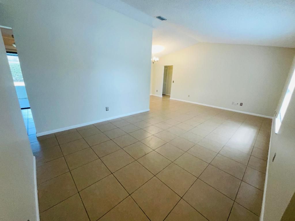 Photo of 2020 SE Parrot Street, Port Saint Lucie, FL 34952 (MLS # R10980499)