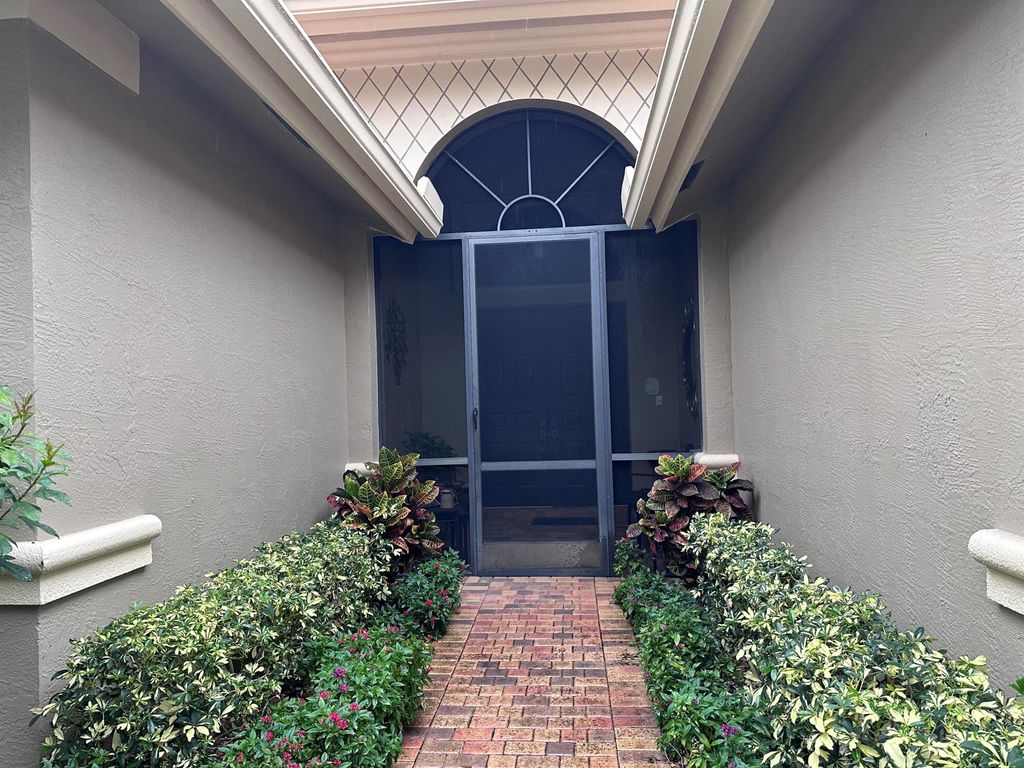 Photo of 8041 E Via Grande, Boynton Beach, FL 33437 (MLS # R11148341)