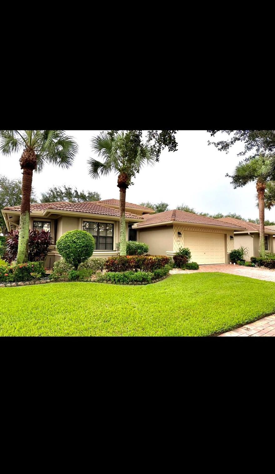 Beautiful Mediterranean-style home in the heart of Boynton Beach featuring the sought-after Palazzo Roma premium model. Offering 3,500 sq ft of total space, this 4-bedroom, 3-bathroom residence boasts soaring ceilings, elegant archways, and a bright, open layout. Spacious kitchen with center island, abundant cabinetry, and granite countertops opens to generous living and dining areas--ideal for entertaining. Large windows and sliding glass doors provide serene garden views and fill the home with natural light. Well-appointed primary suite plus three additional bedrooms offer flexibility for guests or home office. Located in the desirable Tivoli Reserve community with gated entry and resort-style amenities, close to shopping, dining, and major highways.