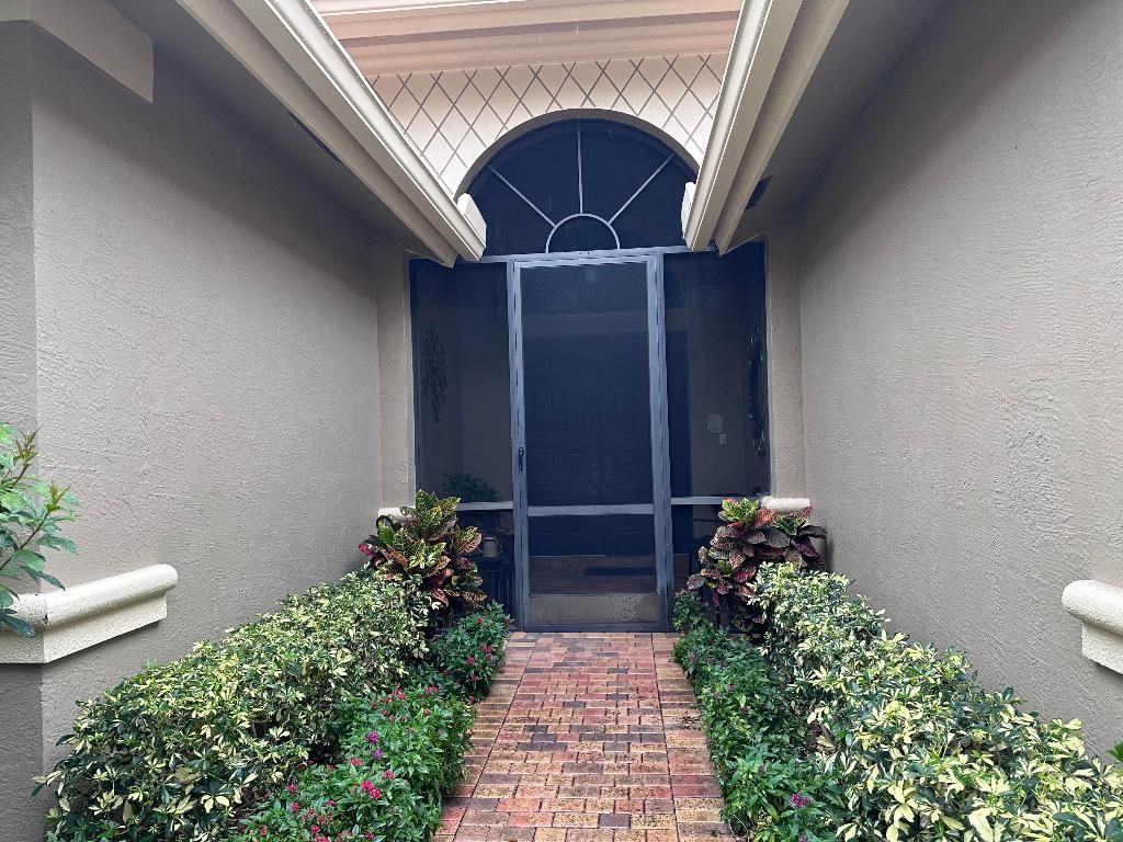 Photo of 8041 E Via Grande, Boynton Beach, FL 33437 (MLS # R11148341)