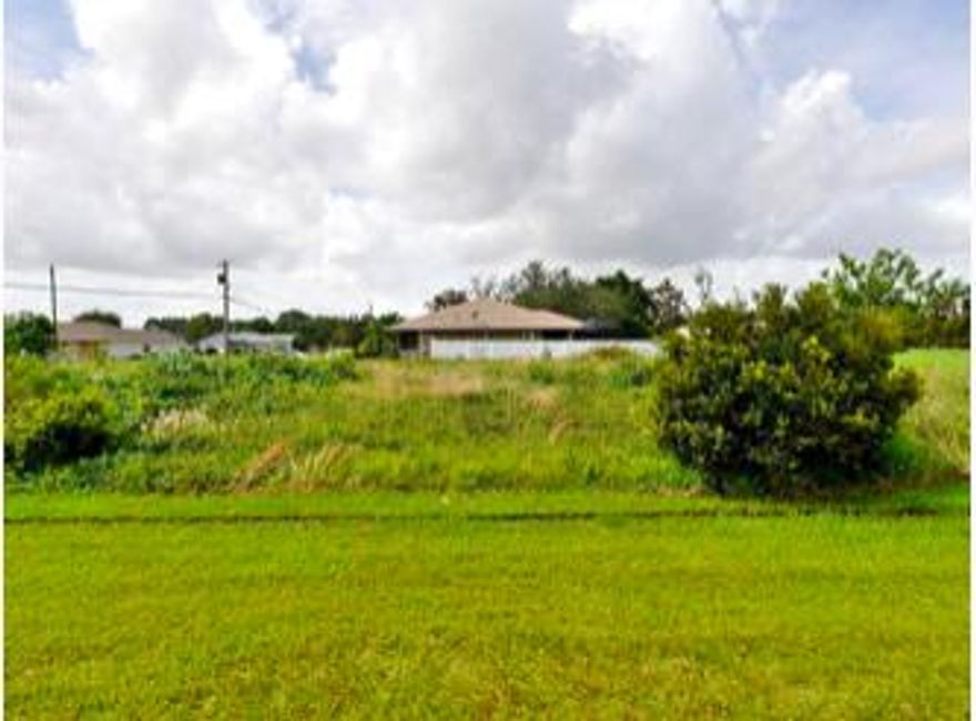 Great corner lot, no trees, just brush. Ready to build your dream home!