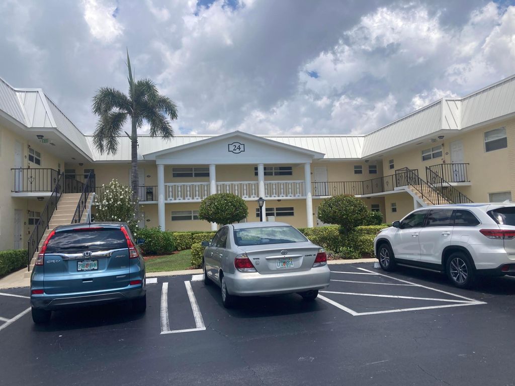 Photo of 24 Colonial Club Drive #103, Boynton Beach, FL 33435 (MLS # R11093135)