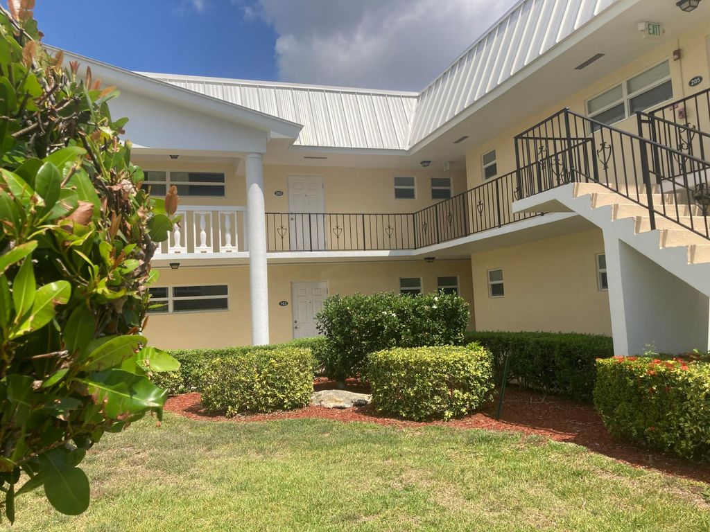 Photo of 24 Colonial Club Drive #103, Boynton Beach, FL 33435 (MLS # R11093135)