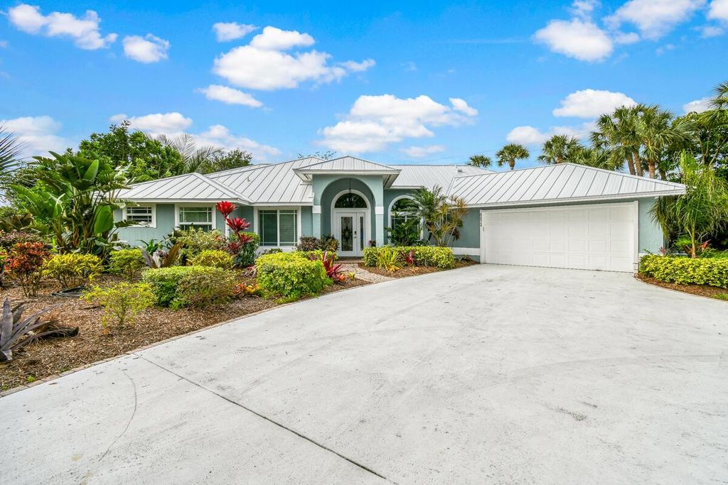 Photo of 8824 SE Marina Bay Drive, Hobe Sound, FL 33455 (MLS # R11000748)